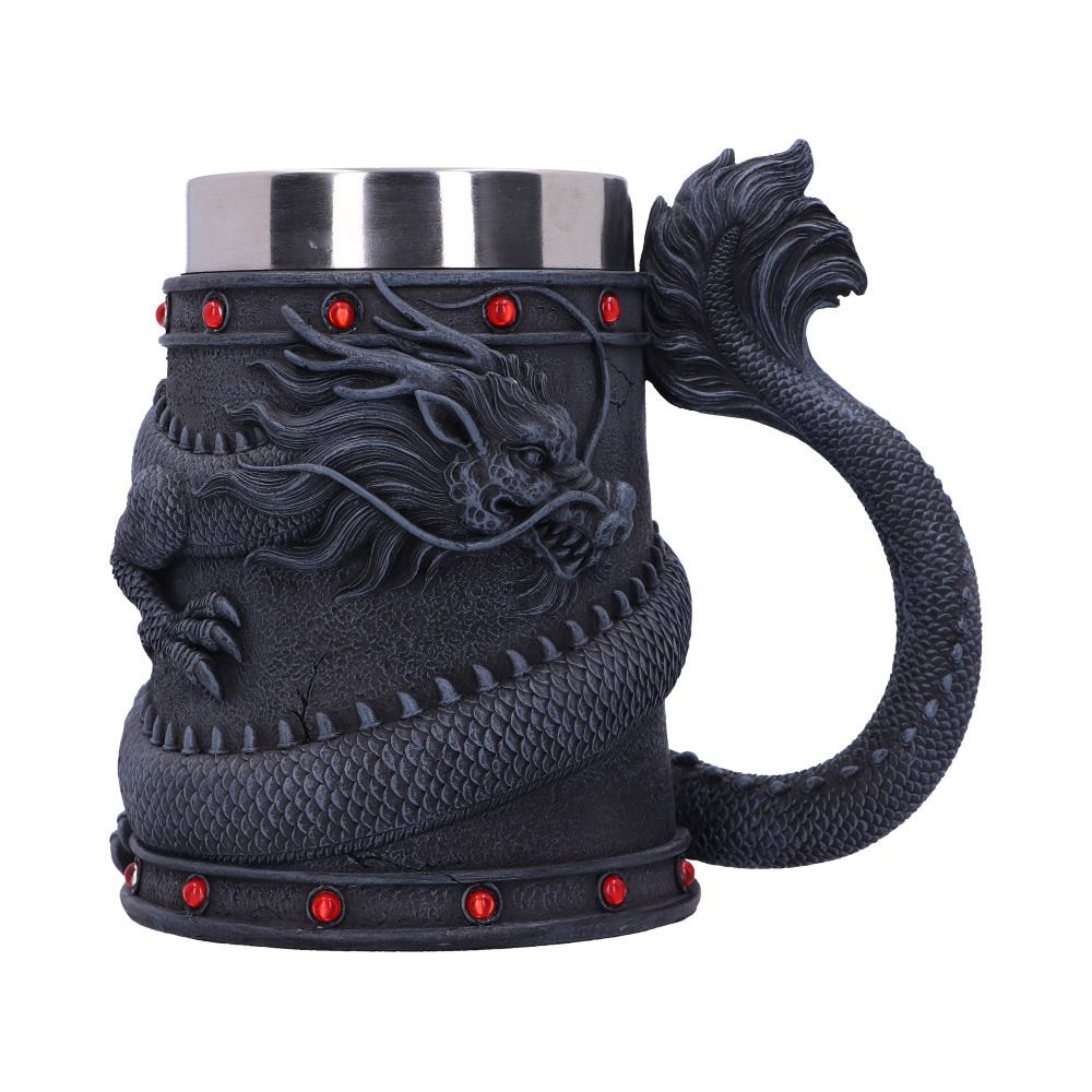 Drink deeply of a rich fantasy world with this enchanting Dragon Coil Tankard. Designed with an onyx Dragon wrapped around the entirety of the tankard, with his tail making up the handle of this incredibly detailed piece. With a removable stainless steel insert for ease of cleaning, this goblet makes a mysterious and enticing addition to any home.