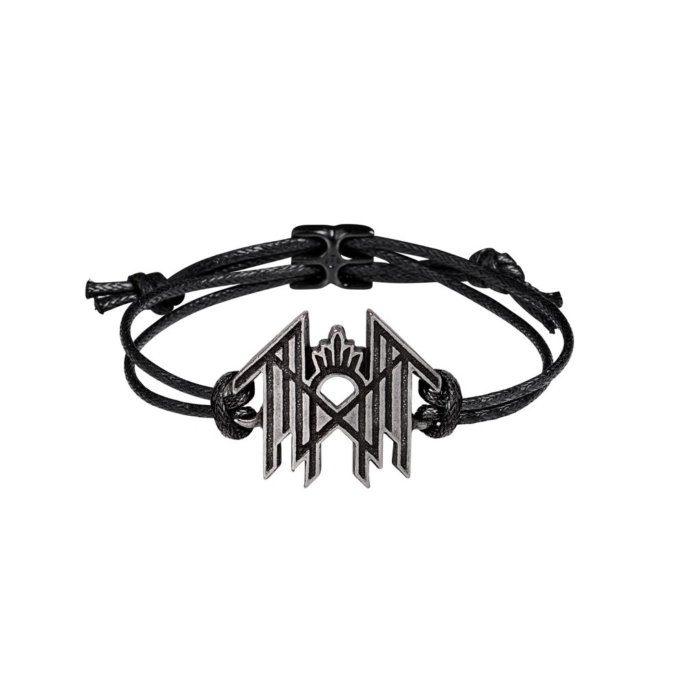 Sleep Token Logo Bracelet - Antiqued Pewter Emblem on Adjustable Corded Wrist Strap Embody the atmosphere and intensity of Sleep Token with this minimalist yet powerful corded wrist strap bracelet, featuring the band's symbolic logo in handcrafted antiqued English pewter. Suspended on a durable adjustable black cord and secured with a blackened pewter fastener, this bracelet is designed for fans who connect with the deeper layers of the band's ritualistic world. Handmade in England, the pewter emblem captures Sleep Token's signature balance of heaviness and stillness, making it a perfect accessory for shows, everyday wear, or as part of your own quiet devotion. • Sleep Token logo in detailed antiqued pewter • Adjustable black cord strap - comfortable and easy to wear • Finished with a blackened pewter fastener for a refined edge • Handmade in England from high-quality pewter • Inspired by the band's symbolic and immersive aesthetic • A meaningful accessory for fans of modern alt-metal and atmospheric sound Simple, symbolic, and full of intent, this Sleep Token corded bracelet is made for those who carry the music with them.