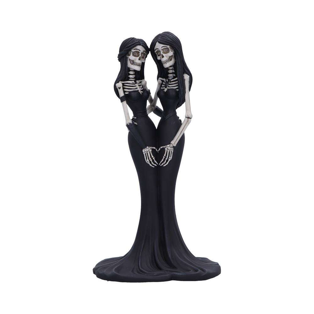 Add a gothic touch to any space with this Eternal Sisters figurine. Holding each other at the waist these sisters make a love heart with their skeletal hands. Heads tilted toward one another as they smile, their long flowing black dresses blend into one, to make the base of the figurine. Cast in the finest resin before being expertly hand-painted, this Eternal Sisters figurine would make the perfect gift to any gothic lover.