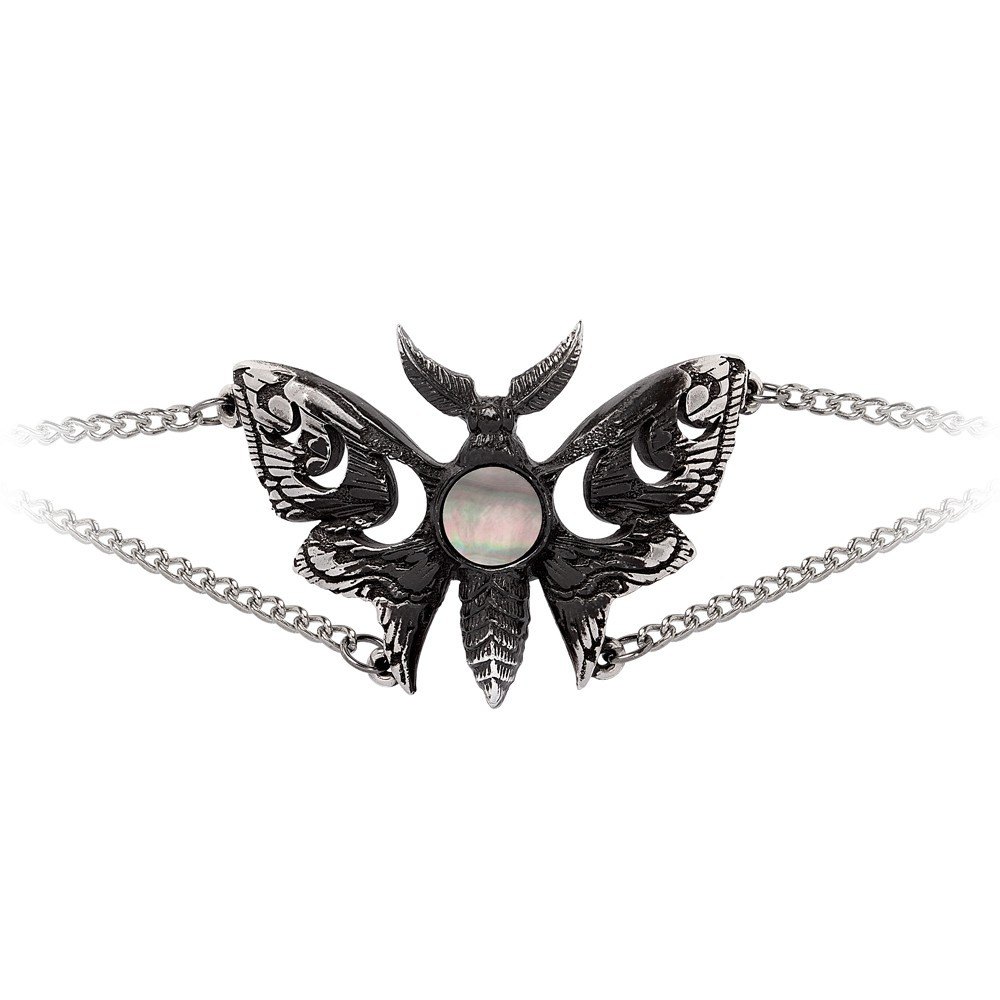 This actias, nocturnal and most rare of species, bears markings uncannily akin to the lunation of our influential moon. She holds court as her lepidopteran subjects flow with unseen tides and the heavens that circle above.