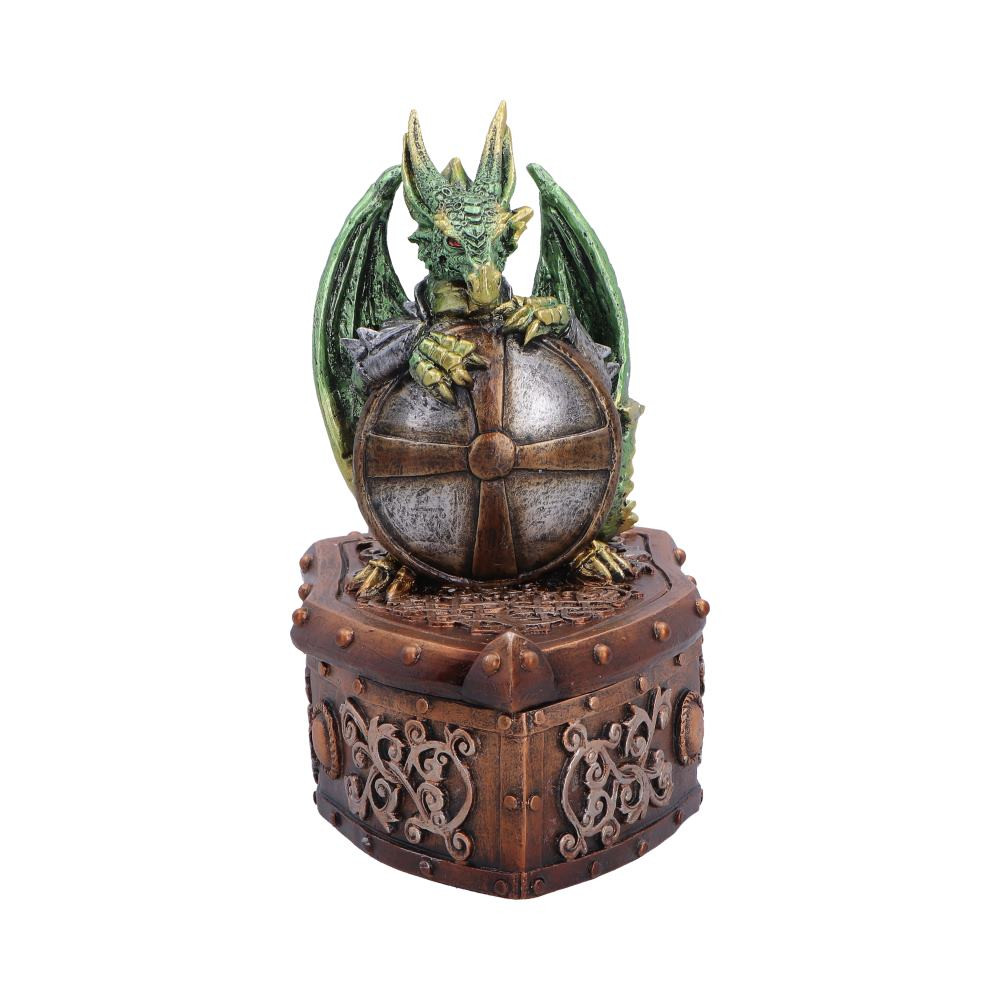The Hoard Protector Box is an originally designed dragon-themed keepsake box that stands 13.4cm tall. Featuring a vivid green dragon clutching a round shield atop a shield box, it is packed with intricate fantasy detailing and a removable lid for storing small trinkets or cherished keepsakes. Hand-painted in dark brown and metallic-like tones, it is carefully packaged to protect its delicate craftsmanship. Perfect for collectors, fantasy enthusiasts or anyone who loves unique decor, this enchanting piece brings a touch of legendary magic to your home while keeping your treasures safe.