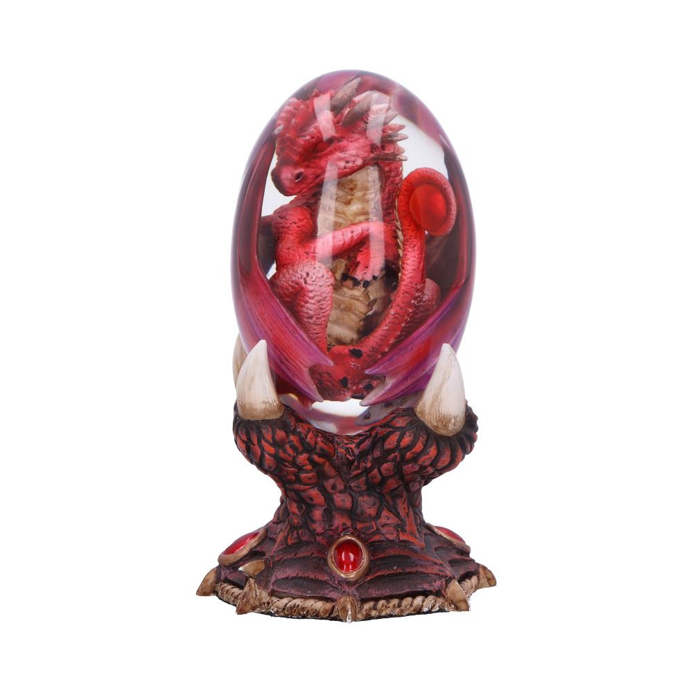 Unleash the fiery spirit of fantasy with Elemental Dragonlings - Fire, a stunning creation by Nemesis Now. This enchanting red fire dragonling is encased within a crystal-clear egg, resting on a beautifully detailed red and bronze stand. Expertly cast in resin and hand-painted with intricate detail, the dragonling is a true masterpiece of craftsmanship. The egg can be removed and displayed separately, offering versatility in showcasing this captivating piece. Arriving in a protective gift box, it makes an ideal present for dragon enthusiasts and fantasy lovers alike, adding a touch of legendary magic to any collection.