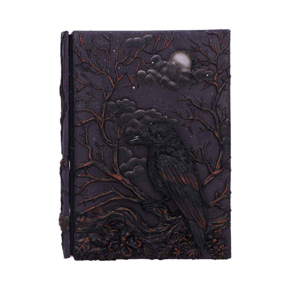 The Raven’s Grimoire Journal is a mystical and atmospheric writing companion featuring a detailed resin cover with a raven perched on twisted branches beneath a full moon. Inside, high-quality blank pages await your thoughts, sketches, or spells, making it ideal for journaling or spiritual practice. Packaged with care, it arrives ready to gift or add to your personal altar. Perfect for witches, writers, and lovers of dark nature aesthetics, this journal invites you to let your creativity take flight under the watchful eye of the raven.