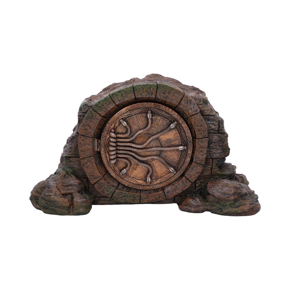 Discover the Wizarding World with our Officially Licensed Harry Potter Door to the Chamber of Secrets Box. The subterranean Chamber of Secrets was created by Salazar Slytherin without the knowledge of his three fellow founders of Hogwarts. This box features carved snakes at the entrance with the face of Salazar Slytherin on the back. The chamber was also home to an ancient Basilisk which resided within the mouth of Slytherin's Statue. Cast in the finest resin before being expertly hand-painted, this Door to the Chamber of Secrets box is ideal for storing your smallest treasures and is perfect for any witches, wizards and muggles alike.