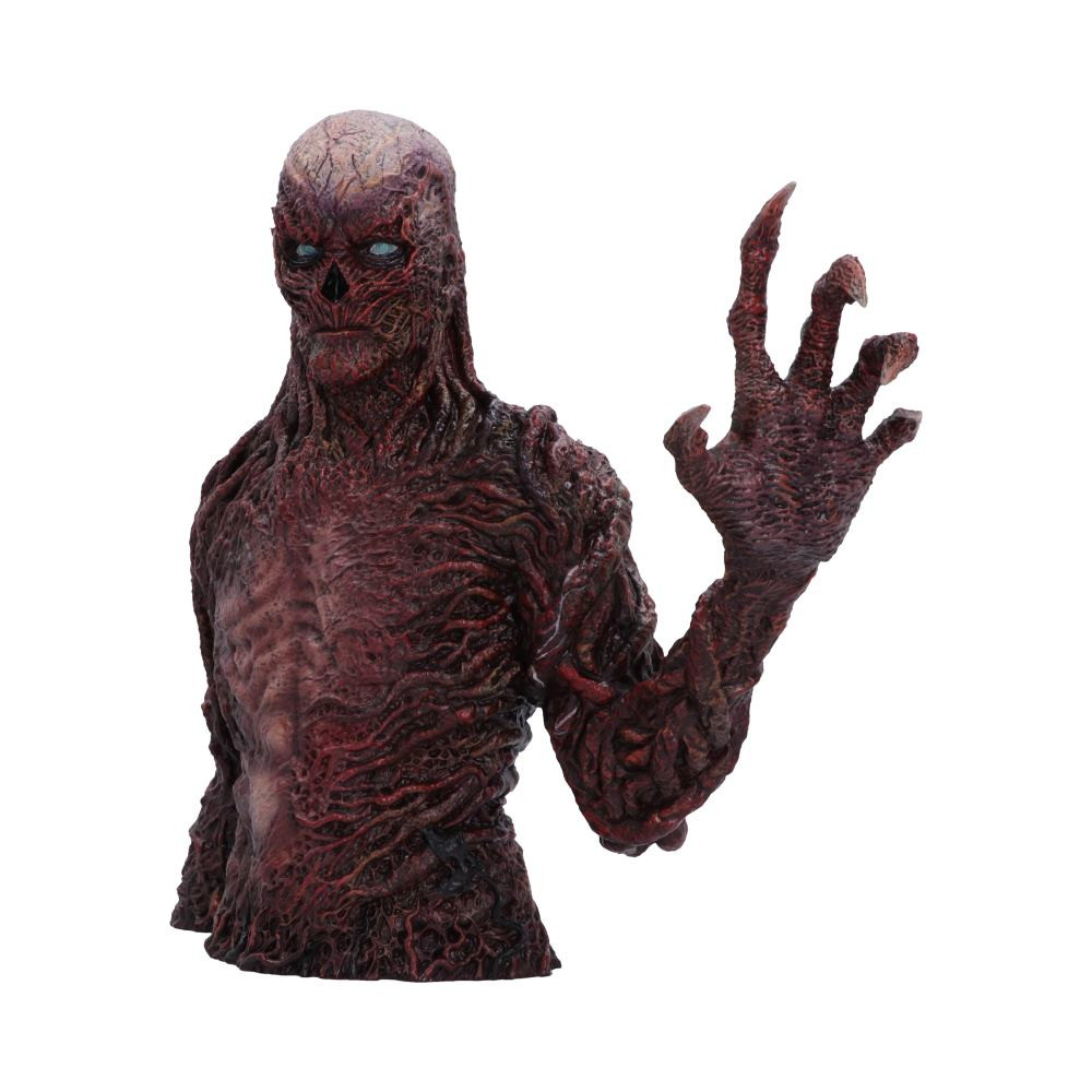 The Stranger Things Vecna Bust is an officially licensed collectible from Nemesis Now, capturing the terrifying presence of Vecna from the hit Netflix show Stranger Things. Standing at 29.5cm tall, it features his upper torso with a menacing raised clawed hand, brought to life through intricate sculpting and expert hand-painting, from his grotesque skin infused with the vine-like tendrils from the Upside Down to his piercing eyes. Cast in high-quality resin and packaged securely to ensure it arrives in excellent condition, this piece is perfect for fans of the series, horror enthusiasts, and collectors alike. Add a dark, show-stopping centrepiece to your display with this striking Vecna bust.