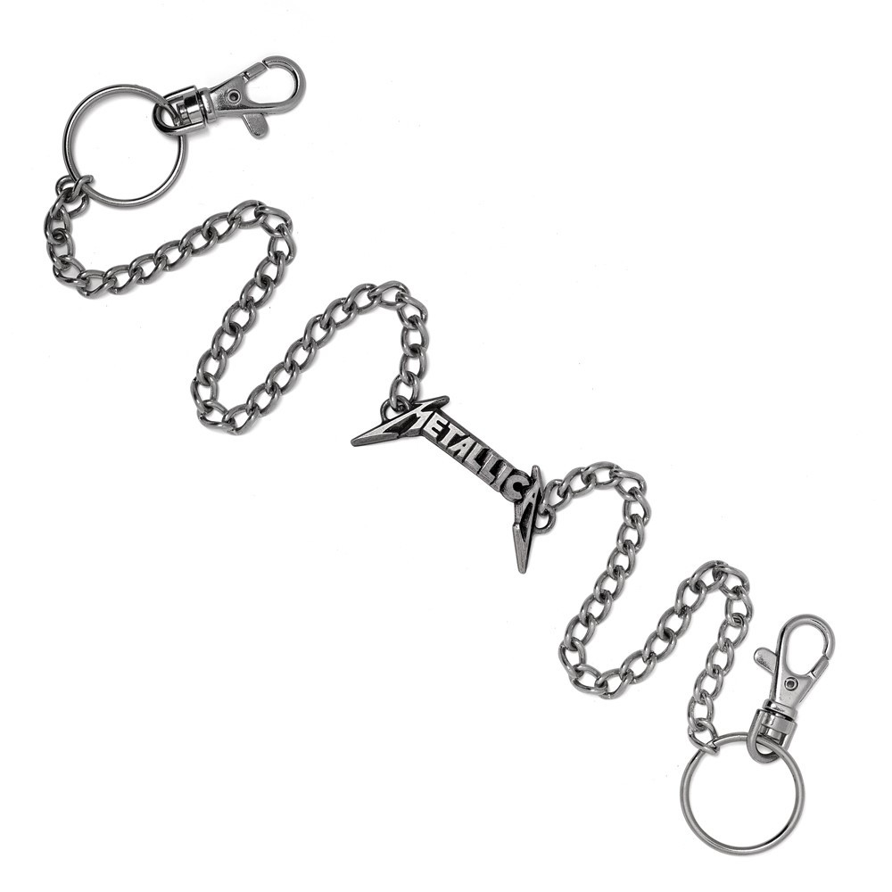 Show your allegiance to metal legends Metallica with this bold wallet chain, featuring a striking handcrafted pewter logo and a flexible, functional design. Built for fans who want to wear their music with pride, this chain includes two trigger clips and two split rings, giving you multiple ways to attach it-whether to your belt loops, wallet, bag, or gear. The antiqued pewter Metallica logo adds iconic edge, while the durable dual chain construction offers a rugged, layered look that suits any heavy metal lifestyle. Whether on the road, at a festival, or rocking your everyday style, this chain is built to last-and to be seen. • Official-style Metallica logo in handcrafted English pewter • Two trigger clips and two split rings for fully adjustable wear • Durable dual-chain design for a layered, industrial look • Handmade in England with premium English pewter • Ideal for metalheads, rock fans, and alternative fashion lovers • Functional and stylish, attach it your way • Official licensed merchandise Carry the spirit of Metallica wherever you go with this versatile and fierce wallet chain.