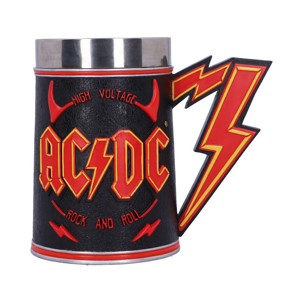 There's a new way to show your allegiance to Rock and Roll Titans, ACDC! created by alternative brand Nemesis Now, their in-house design team have worked tirelessly to construct this amazing tankard! Surrounded with the words 'high voltage rock and roll 'sitting between a pair of red devil horns, the ACDC lightning logo is placed directly in the centre. On the reverse of tankard, the iconic silhouette of Angus Young is emblazoned on a red background, outlined with electric yellow. These vibrant colours are mirrored on the handle which resembles the bands signature lightning bolt. Cast in high-quality resin and hand-painted, the tankard comes with a removable stainless-steel insert so you can spend less time cleaning and more time taking a ride down Highway to Hell! All Hail ACDC!
