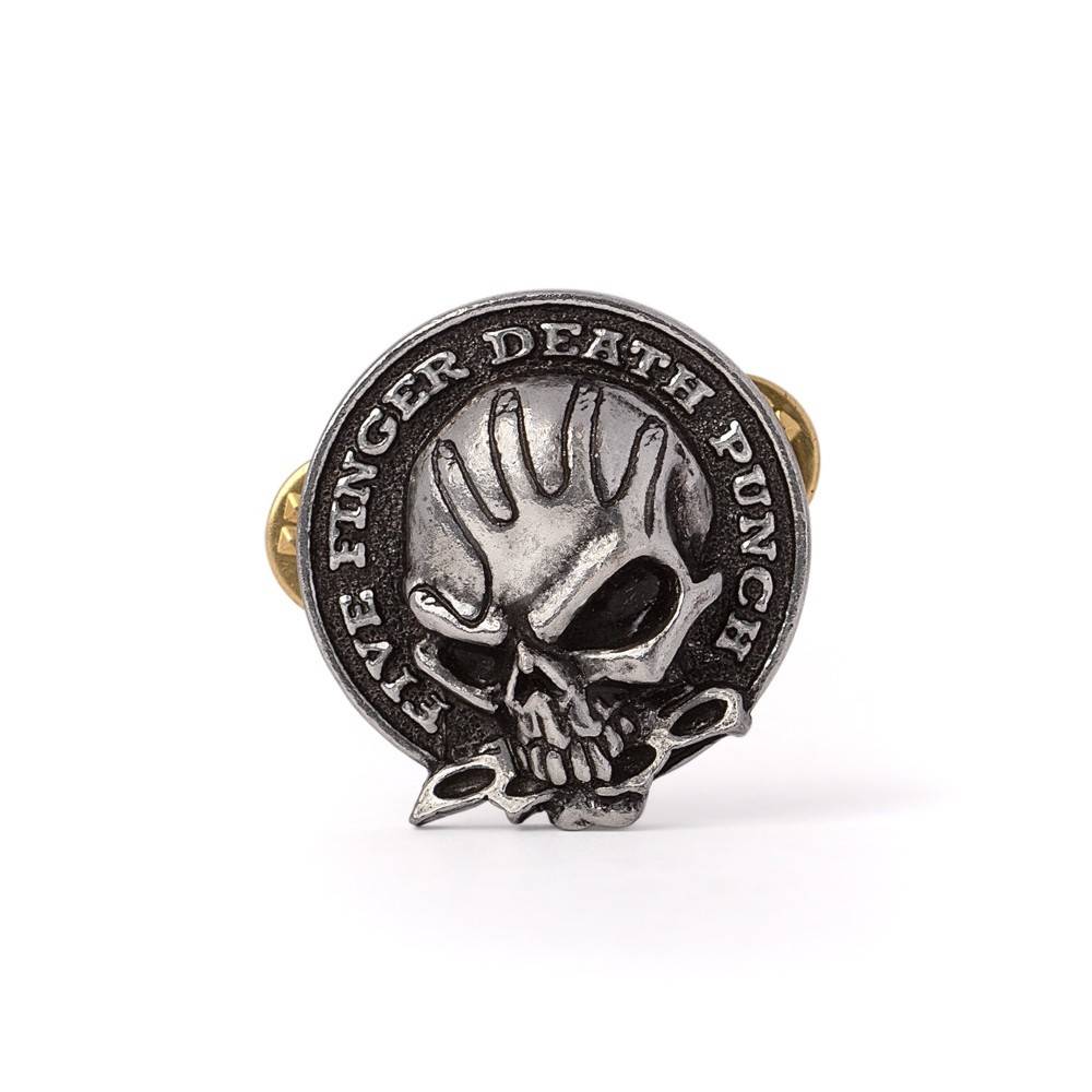 Wear your allegiance proudly with this official Five Finger Death Punch pin badge. Featuring the band's unmistakable skull emblem framed by the "Five Finger Death Punch" insignia, this finely detailed badge is the perfect finishing touch for jackets, backpacks, hats and battle vests. Compact yet instantly recognisable, it allows fans to showcase their connection to one of metal's most successful and enduring bands. Handmade in fine English pewter in England, this officially licensed pin combines authentic band heritage with Alchemy's renowned craftsmanship. Key Features • Officially licensed Five Finger Death Punch merchandise • Features the iconic 5FDP skull emblem • Handmade in fine English pewter • Designed and crafted in England • Secure pin fastening • Perfect for jackets, bags, hats and battle vests • Ideal for fans and collectors