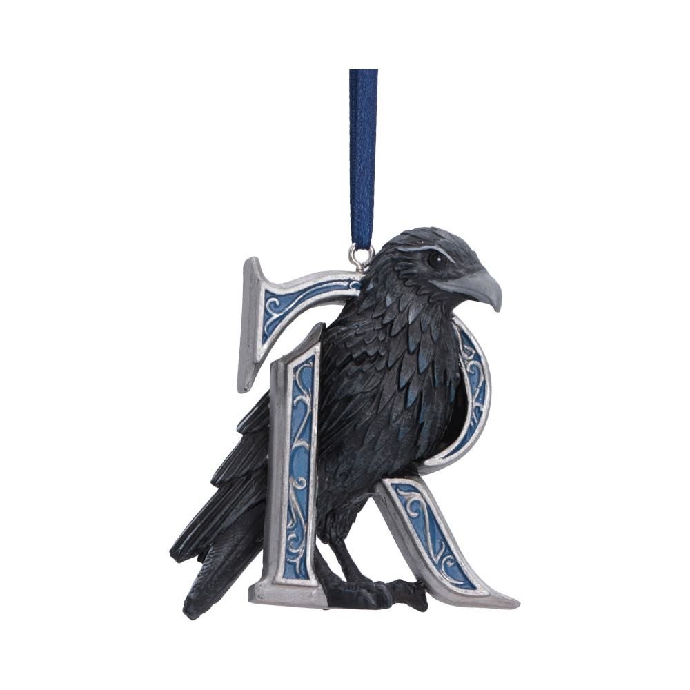 The Harry Potter Ravenclaw mascot hanging ornament is an officially licensed collectible from Nemesis Now, measuring 6.8cm and celebrating the intelligent and creative spirit of Ravenclaw House. Featuring a blue and silver letter ‘R’ with the iconic Raven of Ravenclaw within, it is expertly hand-painted and cast in the finest resin for a high-quality finish and detailed design. Packaged in an officially licensed Harry Potter gift box and complete with a blue ribbon for easy hanging and display, it is perfect for Harry Potter fans, Ravenclaw house members, collectors and gift buyers alike. Bring a touch of Wizarding World elegance into your home and proudly showcase the values of wisdom, creativity, and intelligence with this beautifully crafted ornament.