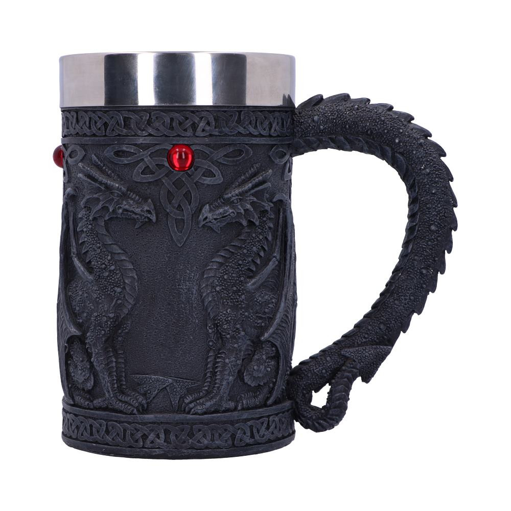Drink with Dragons with this deliciously Gothic tankard, created by Nemesis Now. Black as carved obsidian, the body of the tankard depicts Dragons in profile, sitting and looking at each other. Between their unblinking gazes, a red gem sits at the apex of a Celtic knot pattern. The handle of the tankard is a black Dragon's tail. Cast in the finest resin before being expertly hand-painted, this tankard comes with a removable stainless-steel insert for ease of cleaning.