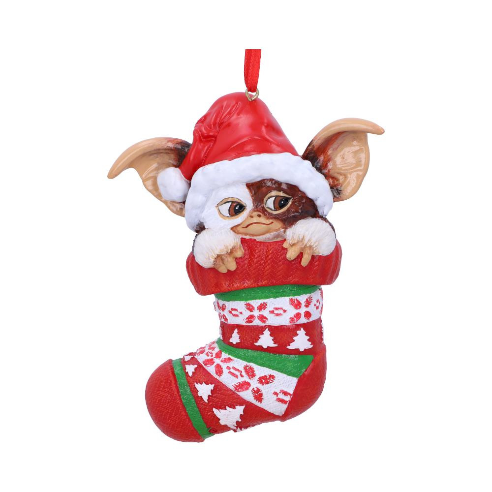 Gizmo and the Gremlins have taken Nemesis Now by storm! Here we see an innocent Gizmo hanging in an ornate fairisle stocking, ready to take up residence in a new home! With a Santa hat placed on his head, this Gizmo is cast in the finest resin before being hand-painted and will become your most treasured festive ornament.