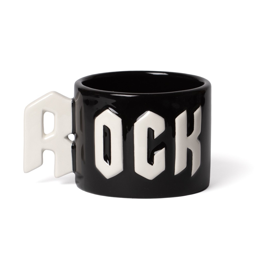 Turn up the volume on your coffee routine with the ROCK Statement Mug. Hand-painted in glossy black with bold white lettering, this standout mug features a letter-shaped handle that screams rock-and-roll attitude. Whether you're a classic rock fan, metalhead, or music lover, this unique mug makes an unforgettable gift or collector's piece. Perfect for rock fans and alternative lifestyle lovers. Features • Hand-painted black mug with white glazed letters • Eye-catching letter-handle • Capacity: 370ml / 13oz • Material: Glazed earthenware ceramic • Supplied in branded gift box • Designed in England, brand origin U.K. • Care: Hand wash only, not microwave safe • Forms part of the incredible Home & Gift collection by Alchemy