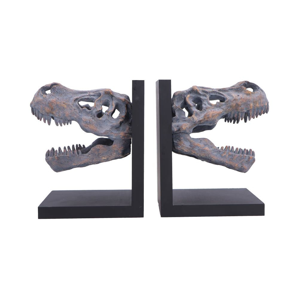 These Tyrannosaurus Rex Skull Bookends are an original, combining bold prehistoric style with practical function. Each bookend features a highly detailed T.rex skull with a unique fossilised colour tone, set on a smooth black base for sturdy, balanced display, and cast in high-quality polyresin with meticulous hand-painted detail. Carefully packaged to protect the sculpting and finish, they arrive ready to use straight out of the box. Perfect for dinosaur enthusiasts, collectors, and lovers of statement decor, these striking bookends keep your books neatly in order while adding dramatic character to any shelf or workspace.