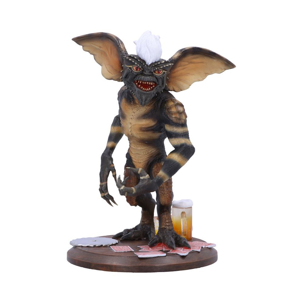 Gizmo and the Gremlins have taken us by storm! Here we see a mischievous Stripe, stood upon a bar table, surrounded by beer and poker cards. Cast in the finest resin before being expertly hand-painted, this Mogwai is ready to cause some mischief. Help us and let the Gremlins run amok in your home today! PLEASE!