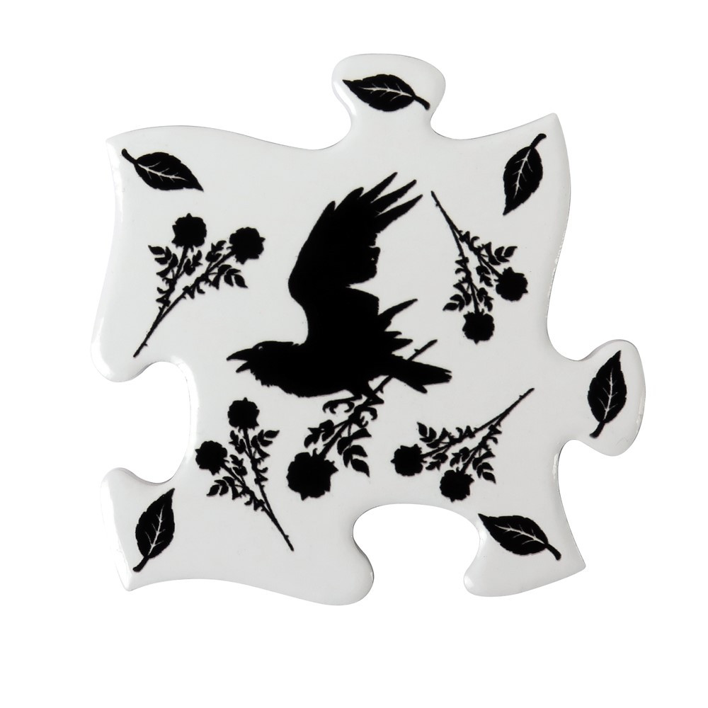 A beautiful 4 piece jigsaw coaster / trivet set decorated in the elegant Alchemy raven and rose design. This set will be a beautiful addition to your home and can be used individually or joined together to make a larger heatproof surface. This darkly elegant design is also presented on a matching trivet / chopping board and spoon rest.