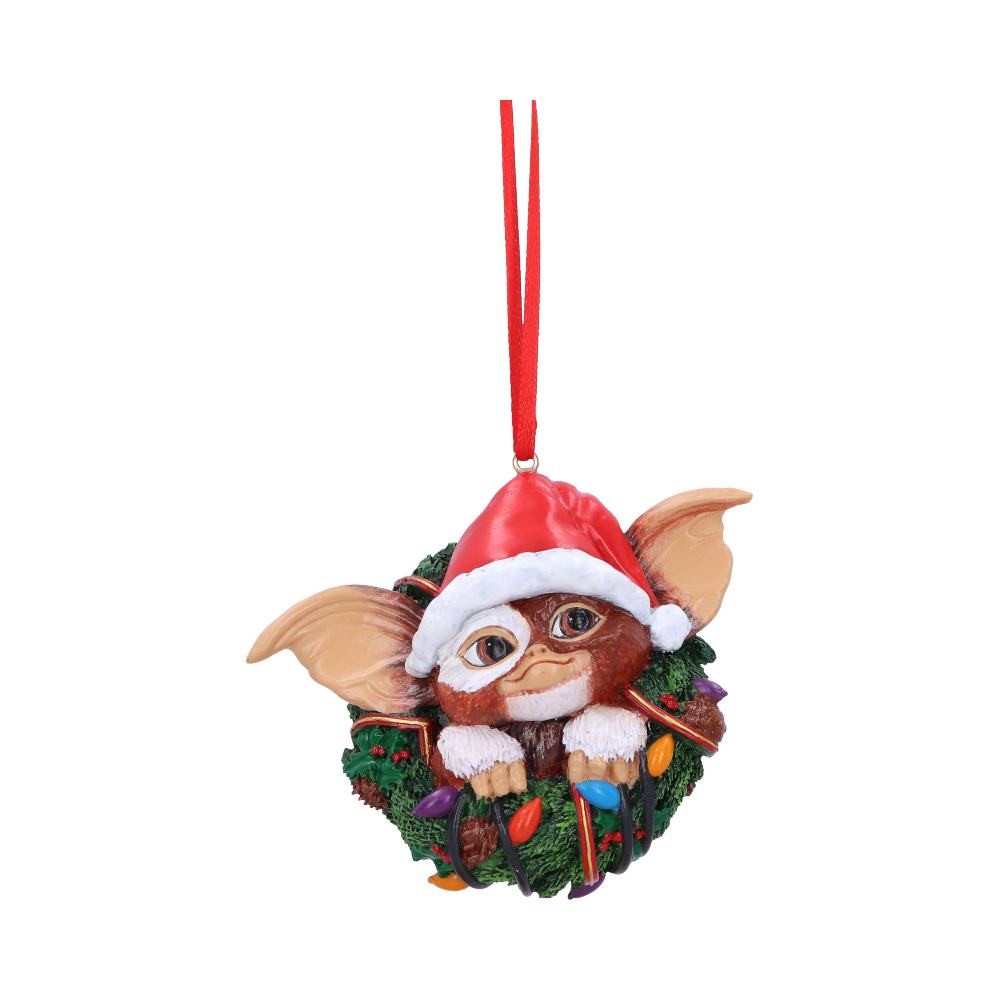 Gizmo and the Gremlins have taken us by storm! Here we can see a cheeky Gizmo emerging from the middle of a Christmas wreath which has been decorated in fairy lights. Cast in the finest resin, before being expertly hand-painted this Mogwai is ready to cause some mischief. Help us and let the Gremlins run amok in your home today! PLEASE!