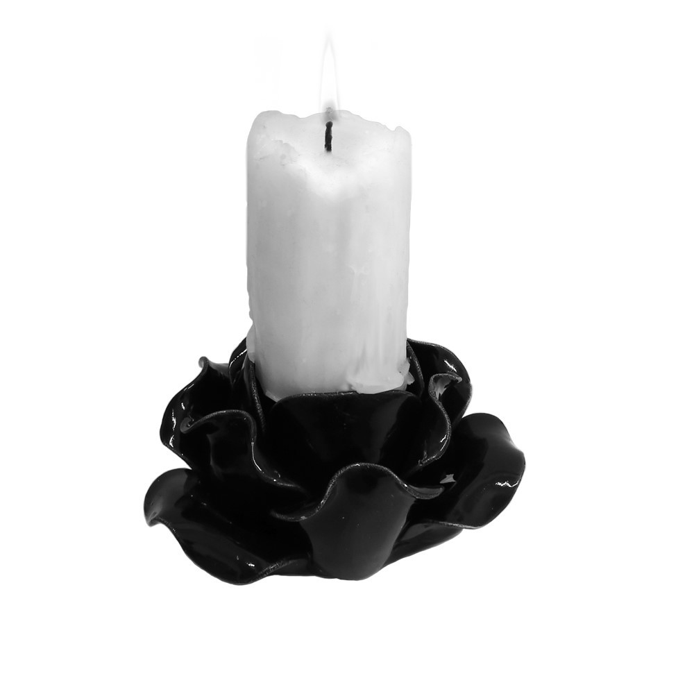 This stunning 'Black Rose' candle holder will look absolutely beautiful on your dining table creating a darkly romantic ambience. Created to fit a pillar candle this holder can also be used as a useful little pot. Perfectly sized for lose change, Alchemy earrings or rings. Each ceramic candle holder/pot is carefully made by hand and is delicate yet striking making it an ideal gift for a cherished one.