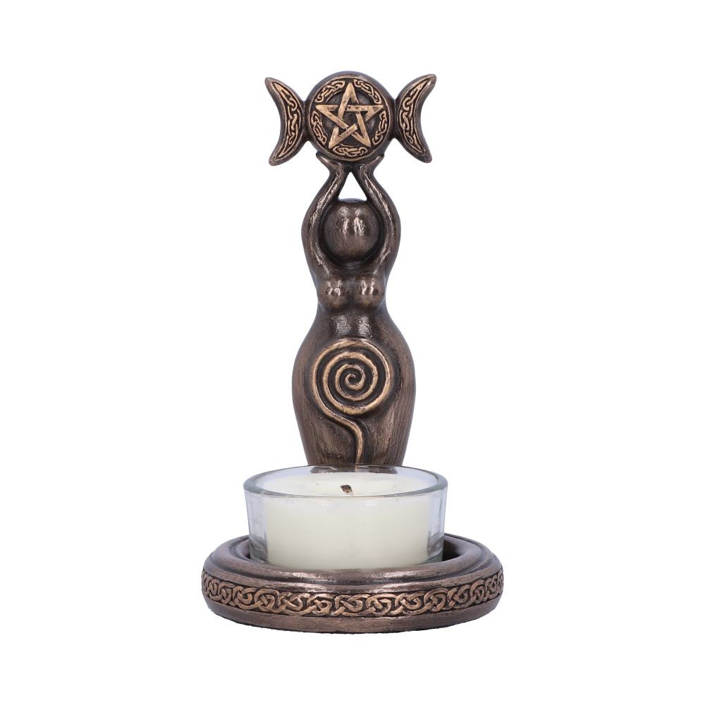 Honour the sacred cycles of the moon with the Triple Goddess Tealight. Rising from a round base, this faceless figure symbolises the eternal feminine, the outline of a tree rising up to their wide hips. Above their head, they hold a triple moon triumphantly. Cast in the finest resin before being given a bronze finish, this stunning Triple Goddess Tealight can keep you grounded to the cycles of the earth and cosmos.
