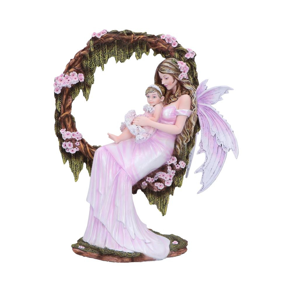 Mother's Affection – A Serene Symbol of Love and Peace Celebrate the purest form of love with the Mother's Affection figurine, a heartwarming depiction of a pink fairy cradling a baby in her lap. This serene piece captures the warmth and tenderness of maternal love in a peaceful forest setting, surrounded by pink blossoms and moss-covered vines. With her delicate pink wings and flowing gown, the fairy embodies grace and harmony, while the loving embrace between mother and child evokes feelings of peace and contentment. Perfect for mothers, nature lovers, or anyone who cherishes family, this figurine makes a timeless and thoughtful gift. A beautiful addition to any home or collection, Mother's Affection brings love and tranquility to any space.