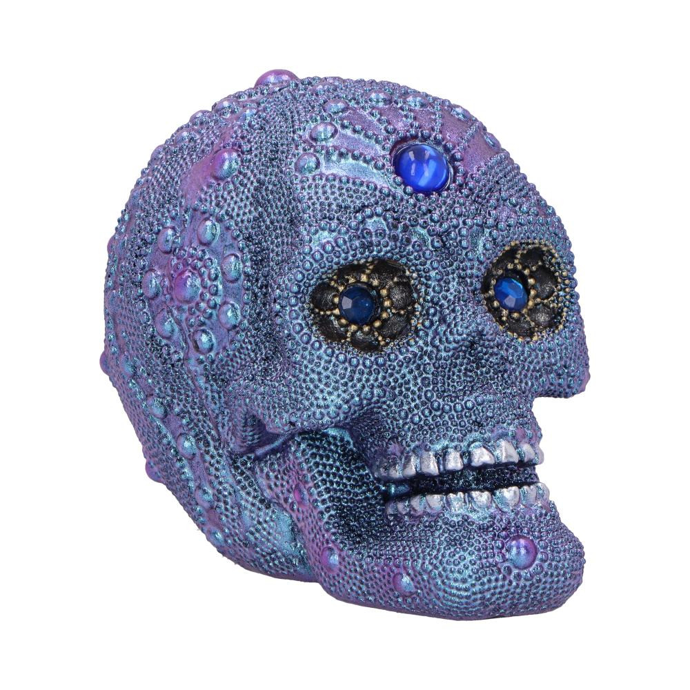 Bejewelled (Small) is a luxurious mini gothic skull featuring the same deep blue and purple gemstone-inspired textures as the original. With shimmering iridescence, golden accents, and a high-quality resin finish, this compact décor piece is ideal for fantasy lovers, gothic collectors, and mystical home décor enthusiasts.