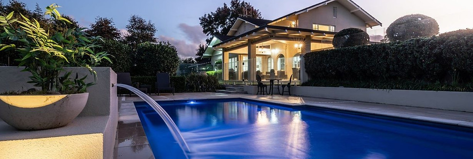 swimming pool lighting and water fall water feature