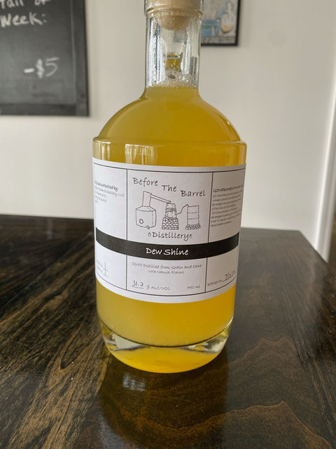 A bottle of Lemon Lime Dew Flavored Moonshine