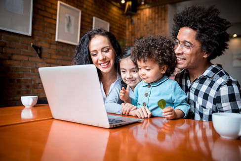 happy-multiethnic-family-having-fun-while-using-la-2021-08-29-17-34-47-utc.jpg