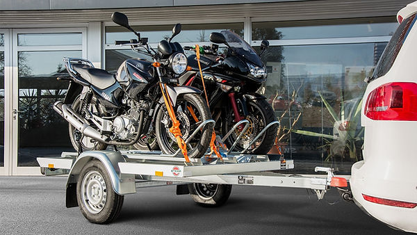 transport motocicleta pe platforma.jpeg