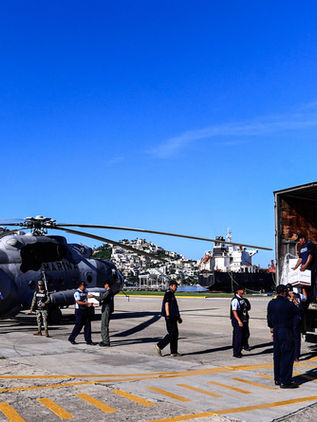 Damnificados por huracán John empiezan a recibir despensas del Gobierno