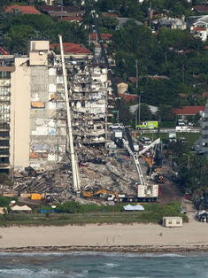 Suman 9 muertos por derrumbe de edificio en Florida