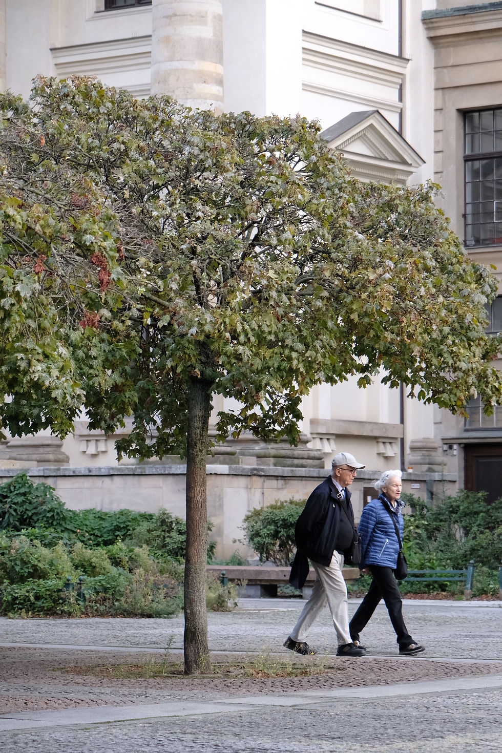 Older couple enjoying a walk through walkable center city neighborhood in philadelphia