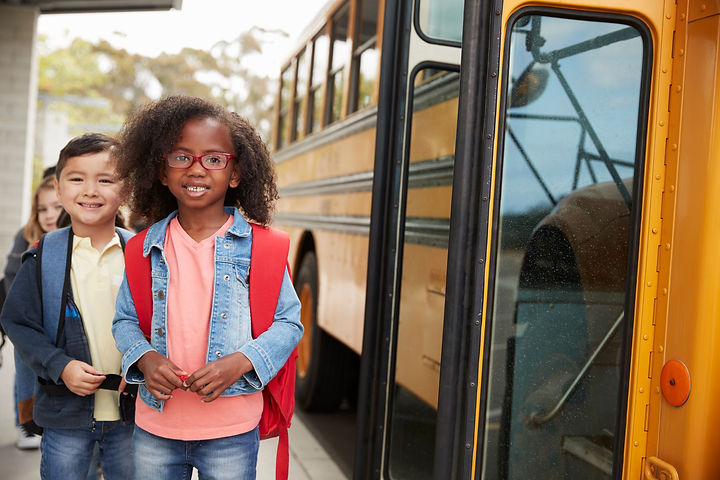 Kids getting on bus.jpeg