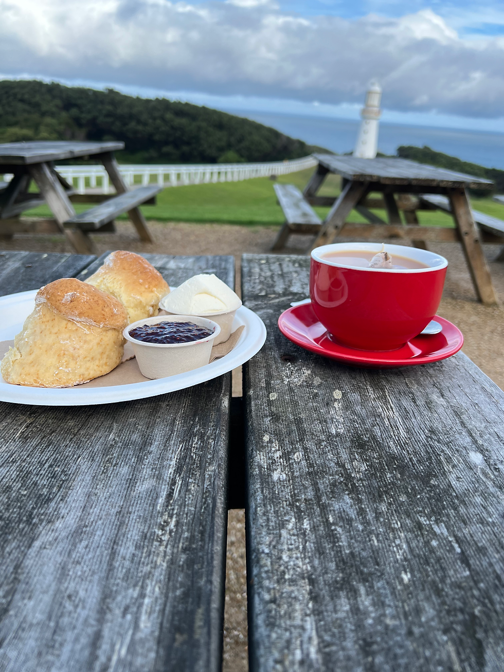 Priority 1: Enjoy a scone with the lighthouse standing proudly in the background.