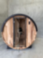 Summit Series outdoor cedar sauna with glass front by Wandering Sauna