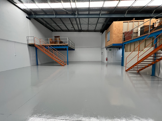 Heavy-duty epoxy flooring in industrial warehouse facility | Industrial Flooring Sydney | CrownCrete | Sydney
