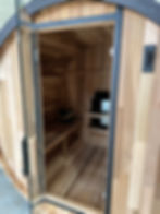 Summit Series outdoor cedar sauna with glass front by Wandering Sauna