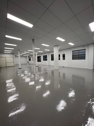 Heavy-duty epoxy flooring in industrial warehouse facility | Industrial Flooring Sydney | CrownCrete | Sydney