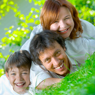 Family portrait outdoors during photography session in Phuket