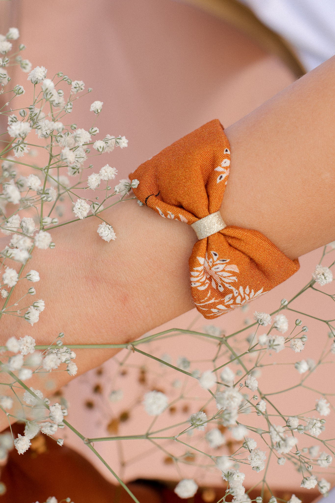 Manchette noeud ocre fleur