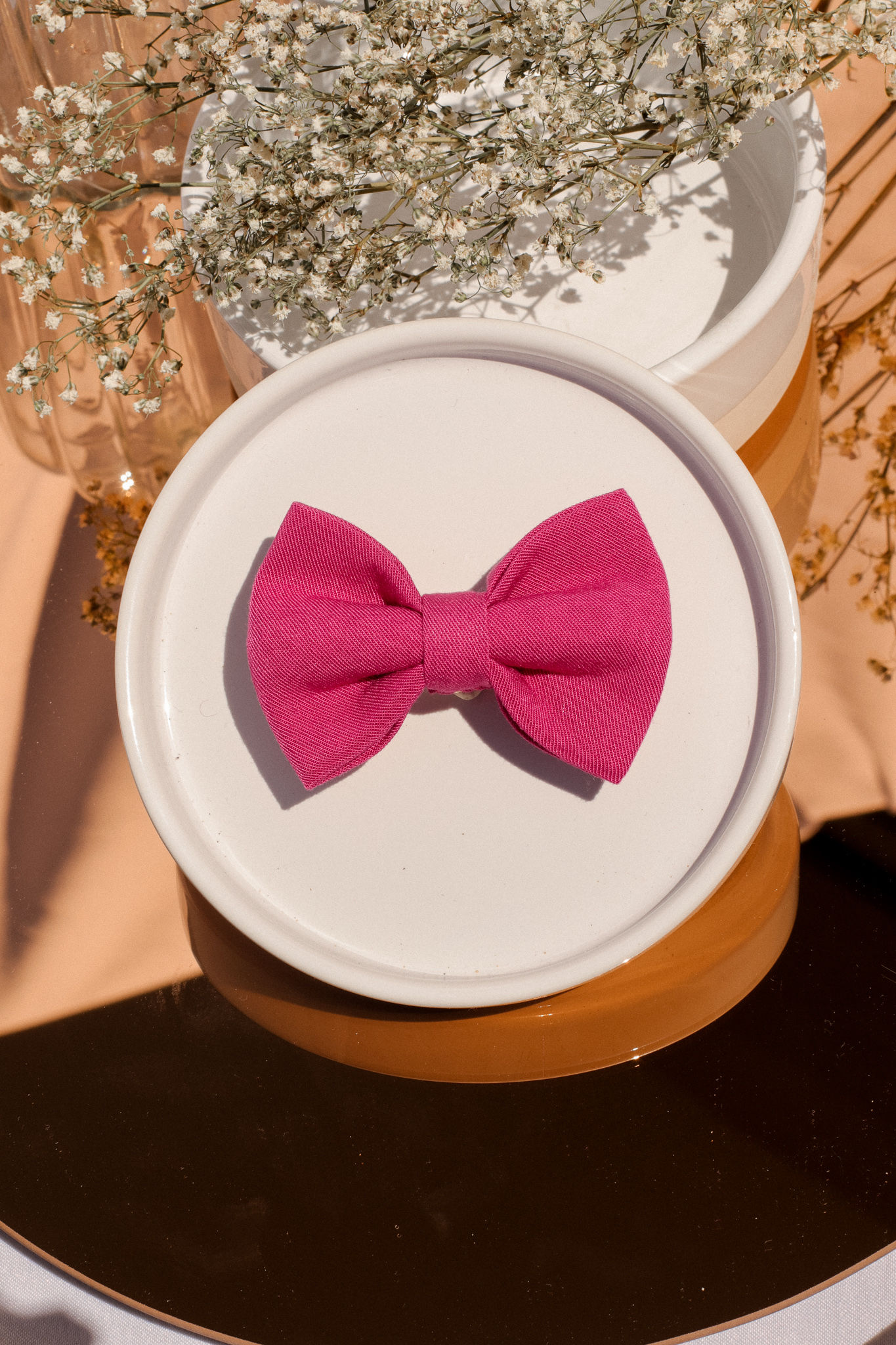 Pin's noeud rose fuchsia