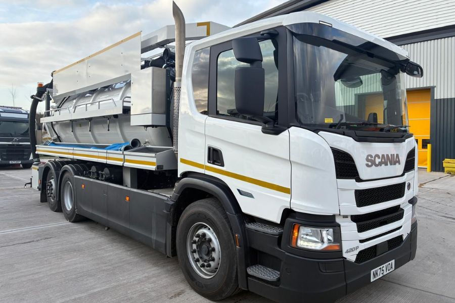 a white Bucher RM120 tanker parked