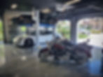sport cars stacked on an OMER Bipark 2-post parking lift