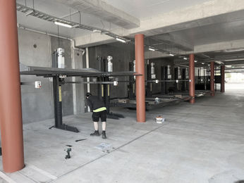 Maintenance visit on 2-post parking lifts