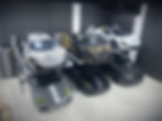 sport cars stacked on an OMER Bipark 2-post parking lift