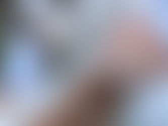 My cute little white pup with my black and white Bebop bracelets