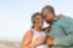 husband-wife-having-drink-balcony_53876-105695.jpg