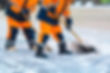 Team member operating snow removal equipment at Mr. Winter Snow Services