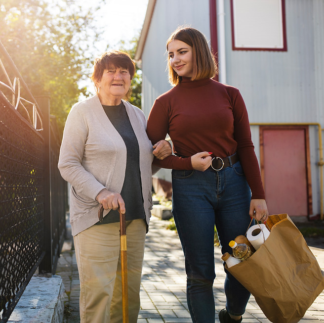 person-helping-their-elder-neighbour.jpg