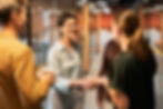 close-up-women-shaking-hands-work.jpg
