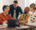 co-workers-discussing-last-financial-analysis.jpg